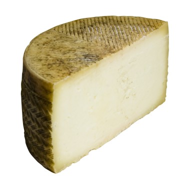 Medio queso de oveja artesano